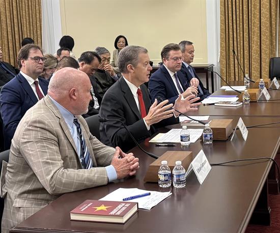 Witnesses testify at the May 14th hearing. From left to right: Ethan Gutmann, Amb. Sam Brownback, Jan Jekielek, and Alim Seytoff, translator for Kalbinur Sidik.