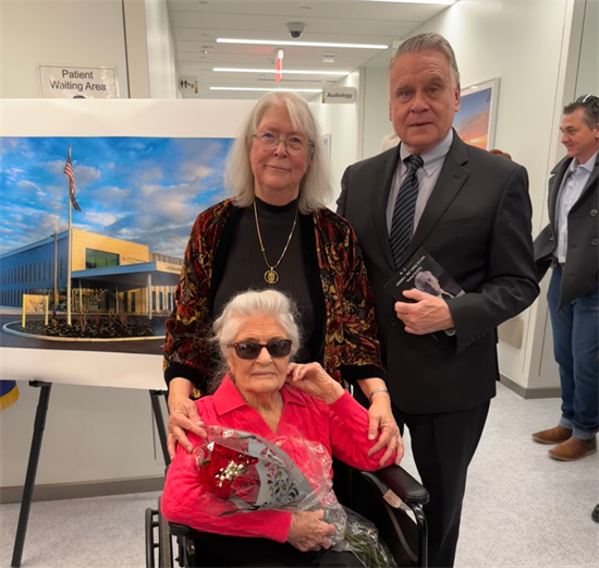 Rep. Chris Smith stands with Renee Lomell and Charlotte Ewart Lomell.